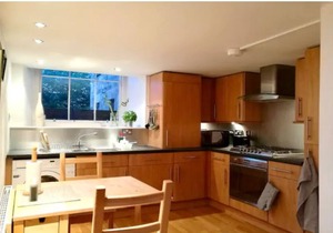 Central Mezzanine Apartment in Historic School
