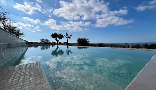 5-bedroom villa in peaceful Mġarr Malta with pool, hot tub, views & gardens