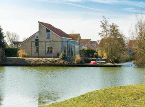 Bungalow in Zeeland with Stunning Waterside Views