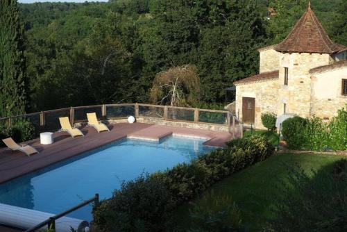 Maison de charme à Puy-l'Évêque avec piscine partagée