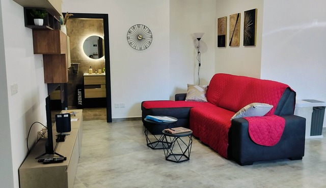 Modern 3-bedroom apartment in charming village of Marsaxlokk .